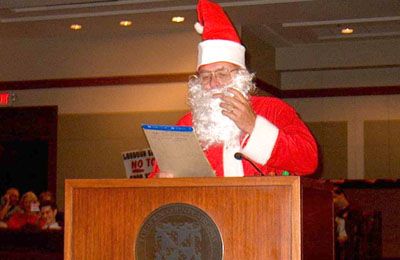 Santa Claus comes to Town. Supervisor Delgaudio invited Santa to town on July 15, 2002, to warn the board of supervisors not to tamper with Christmas and especially the splendid lights in Sterling. Santa gave the board large chunks of coal as a reminder of what bad children get when they misbehave. Santa had to leave after posing for the news media. Most Supervisors said they do not want Christmas lights affected but voted to regulate "all lights" anyway.