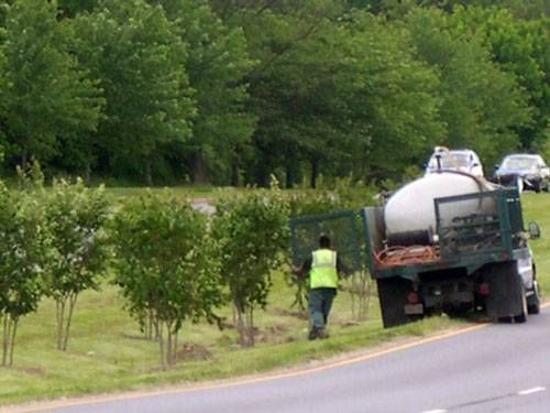 This water truck will make periodic visits to keep the trees watered.