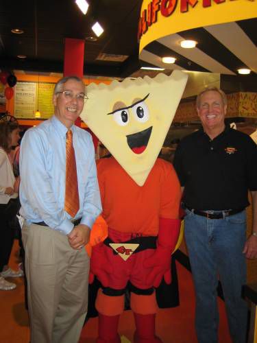 Eugene with the mascot and owner, Mark Dunn, of the California Tortilla at the grand opening on Sept. 21, 2006.
